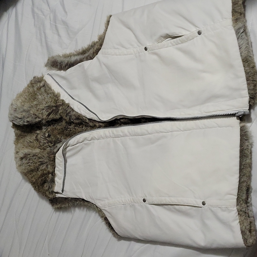 Weatherproof Vest. Faux fur lining. Reversible